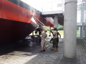 Power washing the replica. It looks fantastic, all clean and shiny.