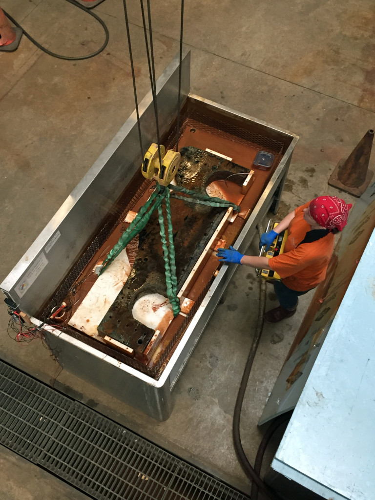 Kate rigging the hoist to the oak gun carriage side support platform.