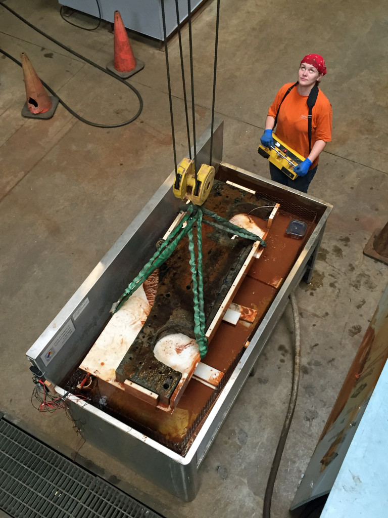 Kate adding tension to the lifting straps.